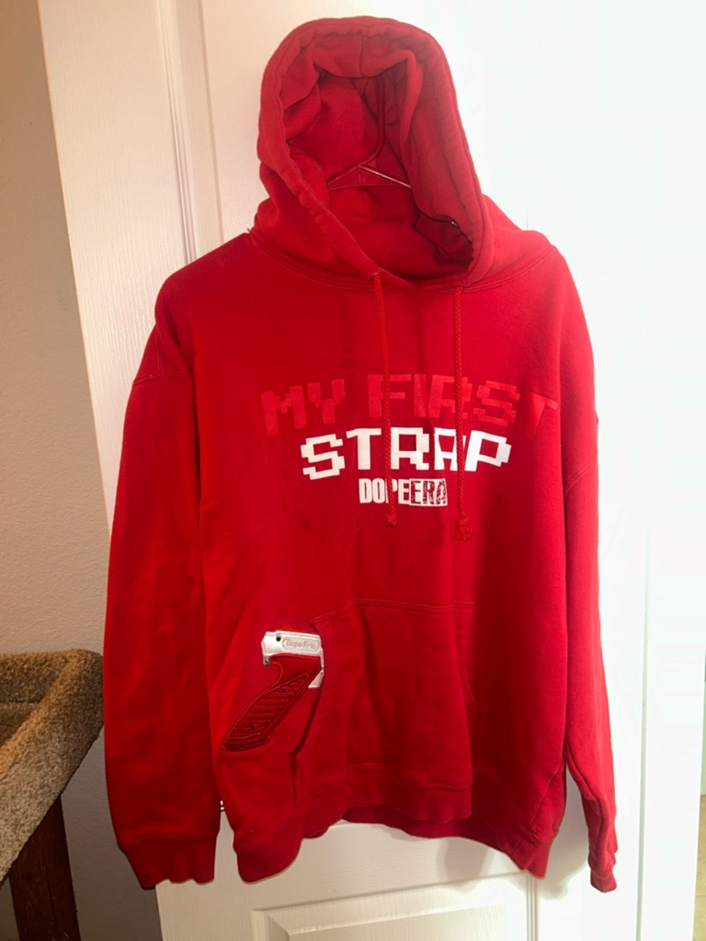 Red Graphic Pullover Hoodie with 'My First Strap' Print